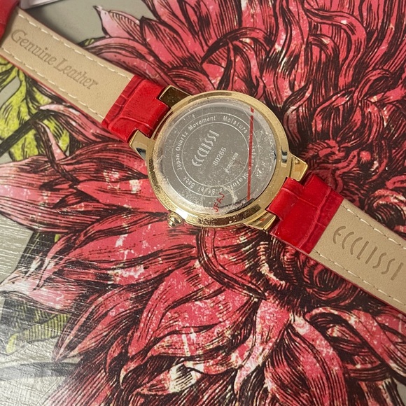 Ecclissi watch with a red genuine leather strap and a crystal-studded bezel.